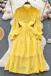 Robe longue trapèze à manches lanternes et découpes fines pour femme