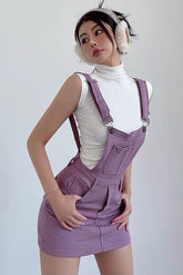 Robe à bretelles réglables, coupe ajustée, portefeuille sur les hanches