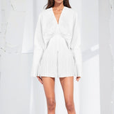 Veste architecturale plissée à manches ballon, col en V, ceinture et fermeture éclair