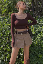 Jupe trapèze taille basse à ourlet évasé et plissée unie avec ceinture