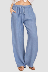 Einfarbige Hose mit Schlitzen und Taschen, weitem Bein und lockerer Passform