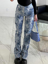 Pantalon évasé à jambe droite