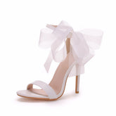 Superbes sandales à talons hauts avec bride à la cheville et bordure en nœud - Blanc