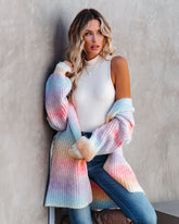 Strickjacke mit Gürtel in sanften Pastelltönen