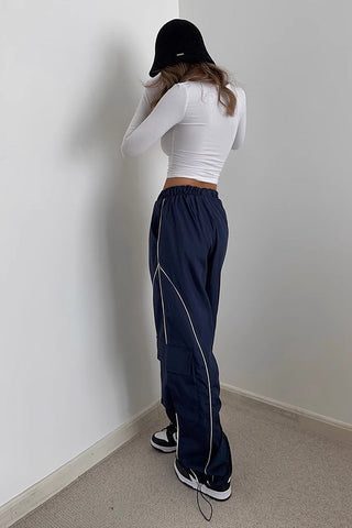 Pantalon de sport à taille élastique et coutures latérales contrastées