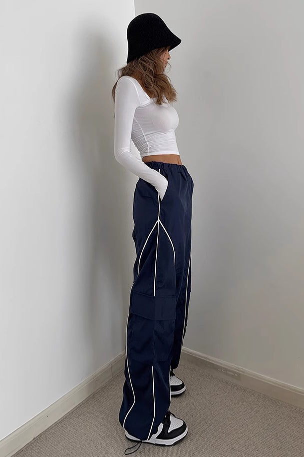 Pantalon de sport à taille élastique et coutures latérales contrastées