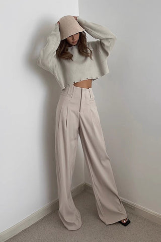 Pantalon à jambes larges et poches obliques