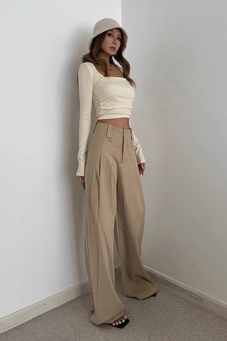 Pantalon à jambes larges et poches obliques