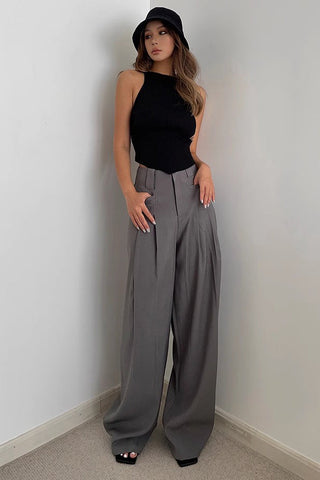 Pantalon à jambes larges et poches obliques