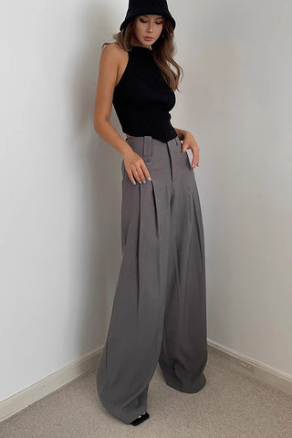 Pantalon à jambes larges et poches obliques