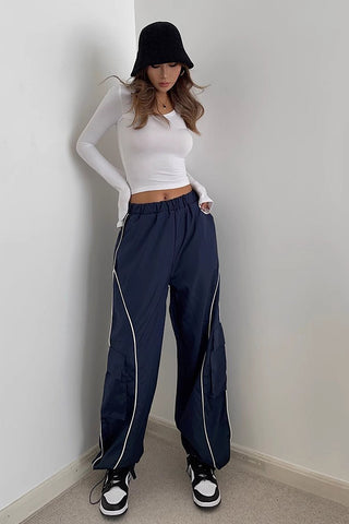 Pantalon de sport à taille élastique et coutures latérales contrastées