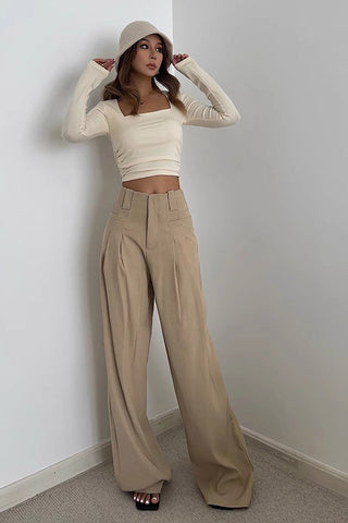 Pantalon à jambes larges et poches obliques