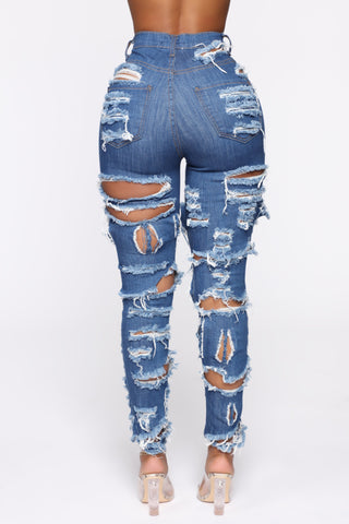 Vous coupez un jean skinny usé - Bleu foncé