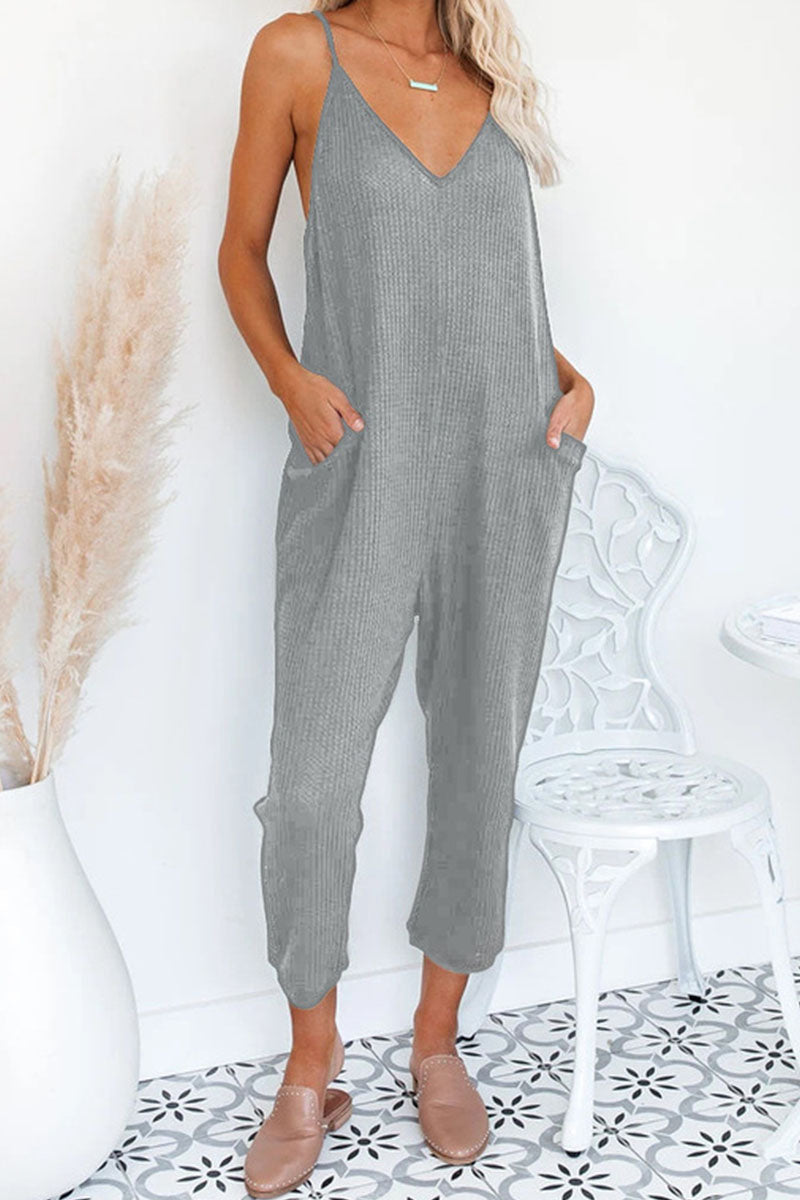 Einfarbige, lockere Jumpsuits mit V-Ausschnitt und Taschen