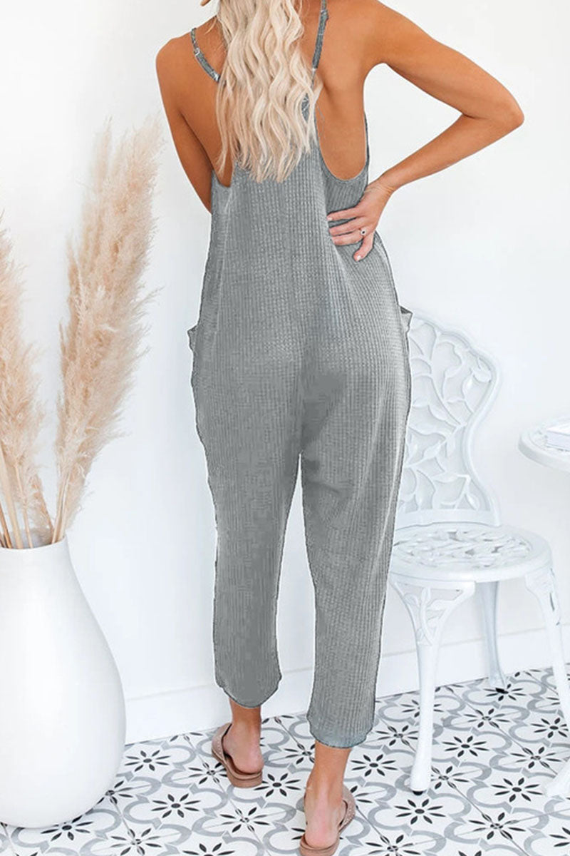 Einfarbige, lockere Jumpsuits mit V-Ausschnitt und Taschen