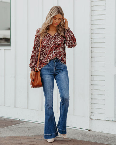 Turned Season Button Down Tassel Blouse