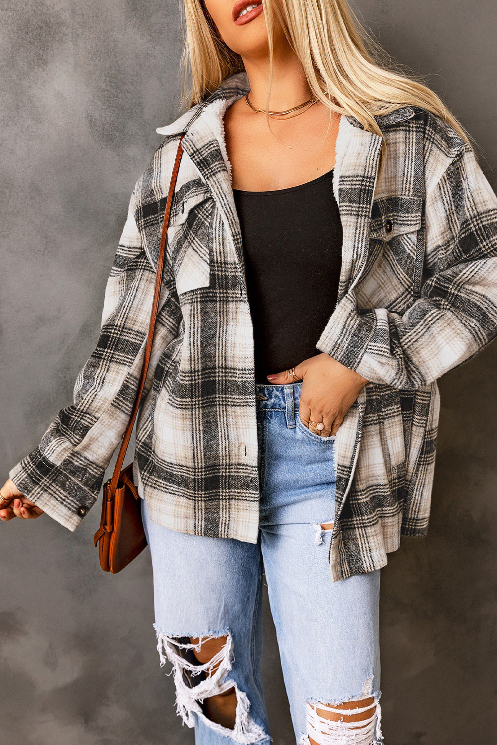 Schwarze Vintage-Jacke mit kariertem Fleecefutter