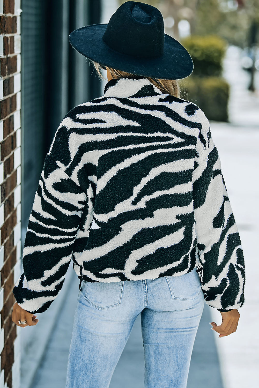 Schwarze Teddyjacke mit Zebra-Print und hohem Kragen