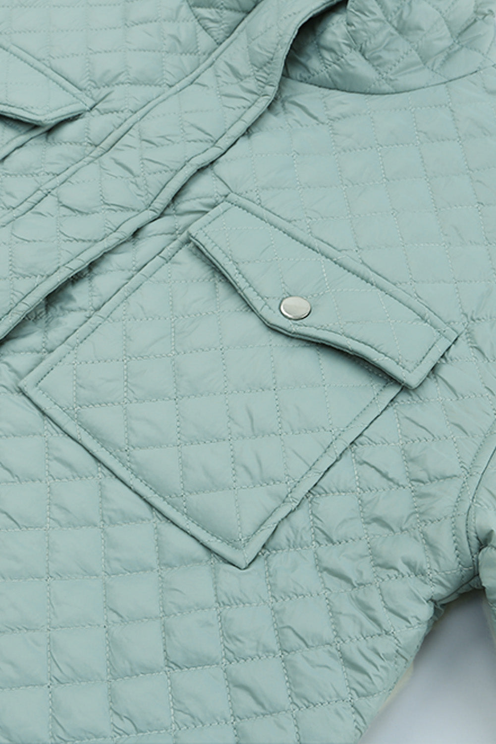 Veste courte zippée matelassée verte à poches